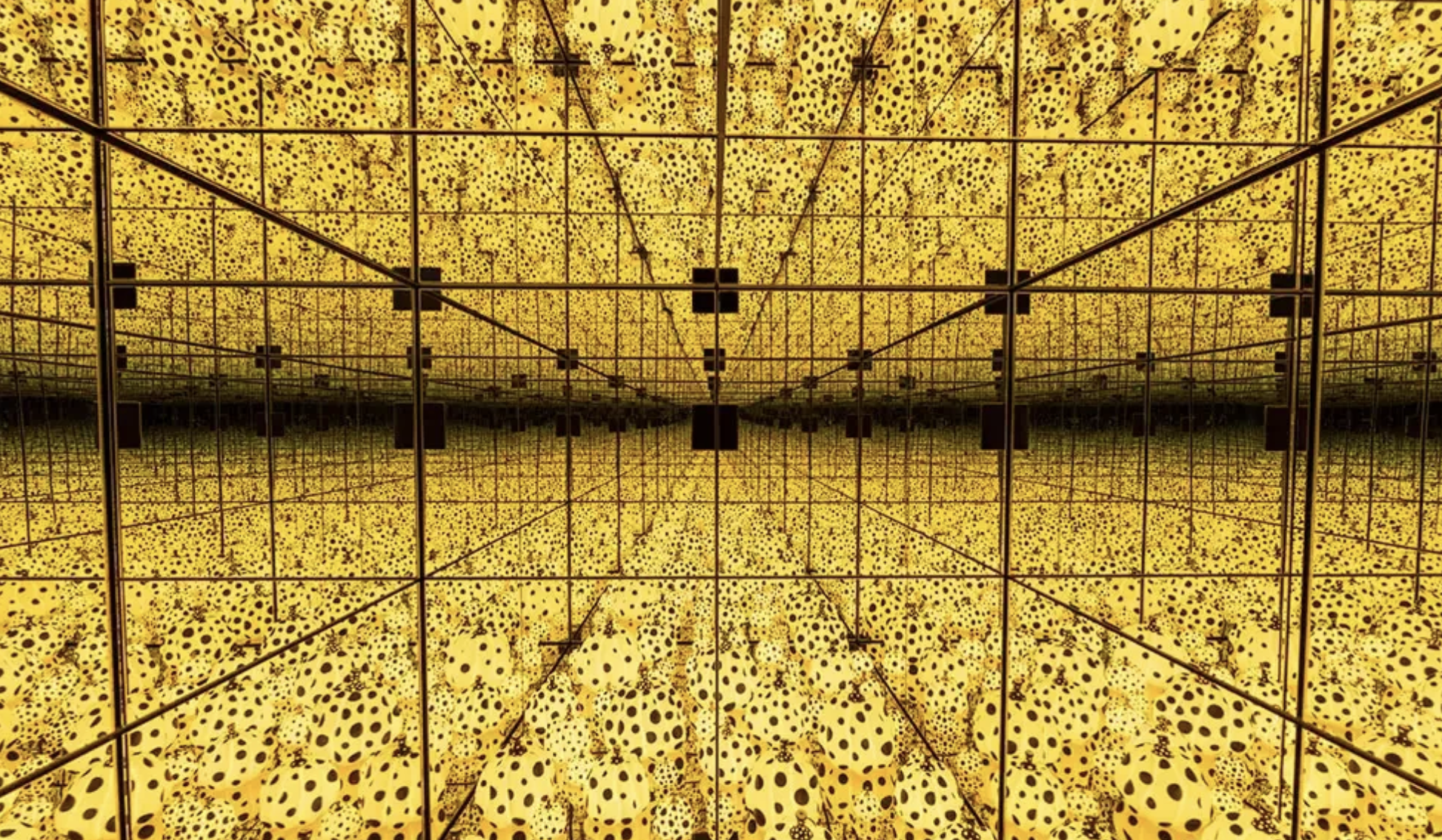 A crop of pumpkins are reflected into infinity by a set of internal mirrors in, THE SPIRITS OF THE PUMPKINS DESCENDED INTO THE HEAVENS, 2017 © YAYOI KUSAMA
